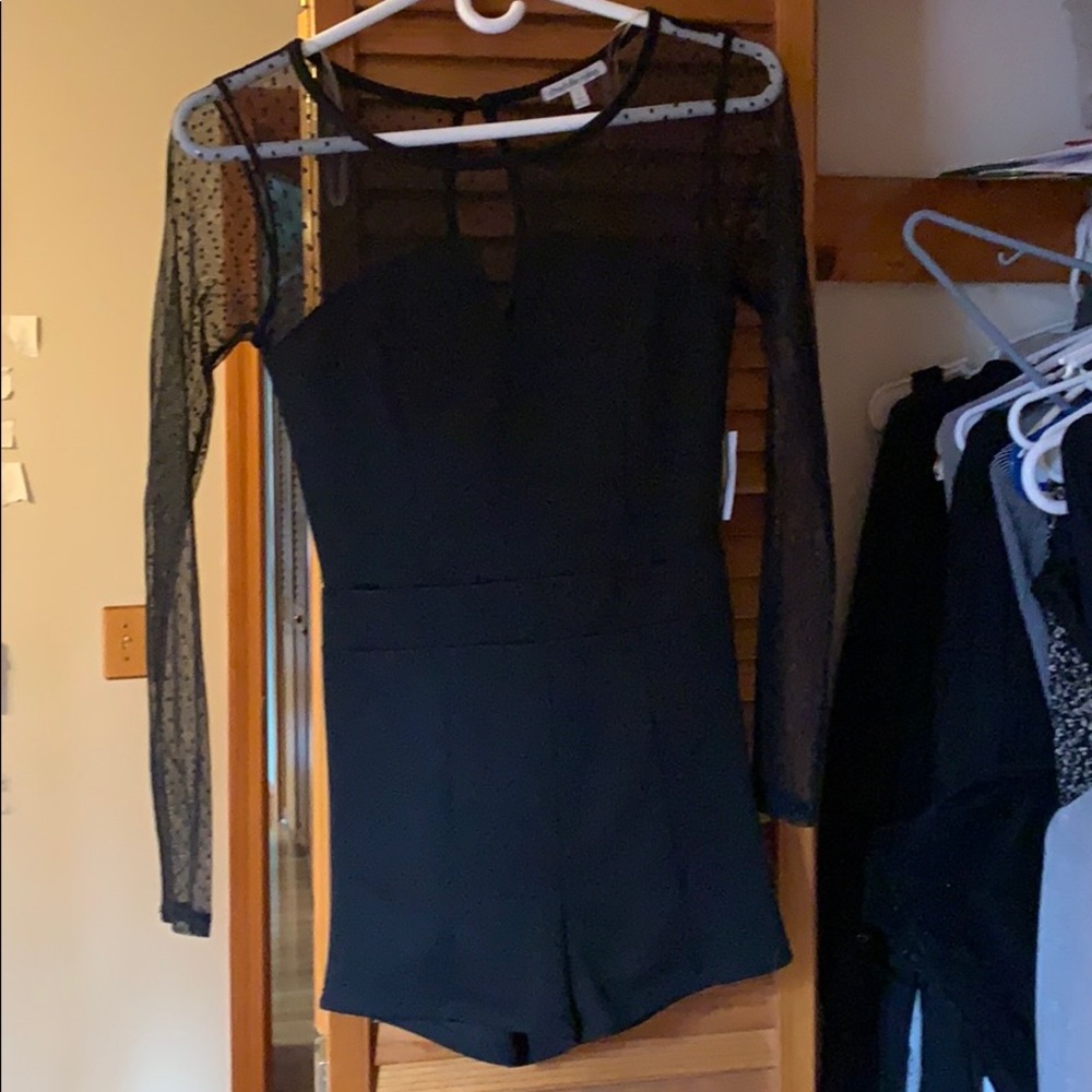 Charlotte Russe romper with tags still on it